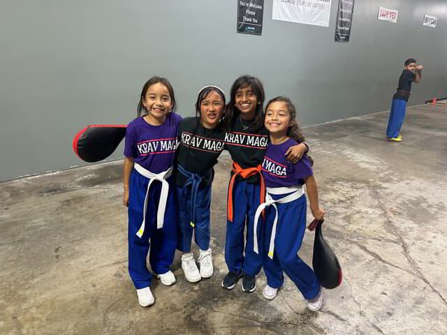 Kids practicing martial arts safely with their instructor in Anaheim